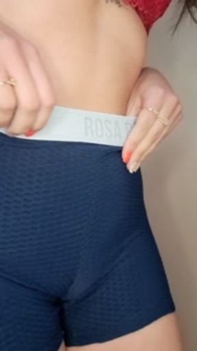 brunette with a big ass trying on her tight shorts without panties