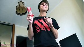 Cute twink sucks dick of his friend, using a strawberry sauce