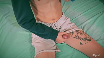 Sport Twink Magic C Jerking His Big Cock Through The Side of His Shorts