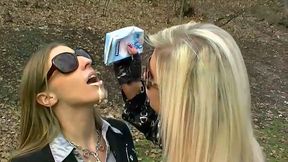 Two wicked sluts in coats get messy and dirty on public in park