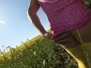 Walking in a yellow field in a yellow stocking