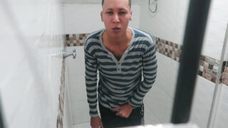 Horny gay whore jerks off in the bathroom