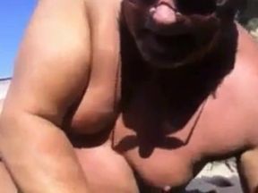 Mature Man Masturbating at the Beach