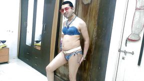 Hot sissy crossdresser femboy Sweet Lollipop in a denim bikini with accessories.