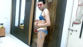 Hot sissy crossdresser femboy Sweet Lollipop in a denim bikini with accessories.