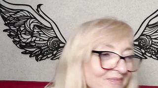 Blonde amateur MILF IngritSno with glasses on webcam