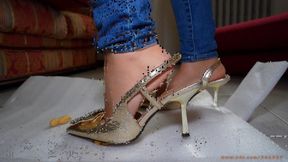 Food crushing with high heel sandals - very slow motion smashing long cip on 4K UHD