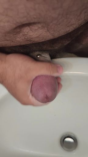Man rubs thick cock during intense solo masturbation session