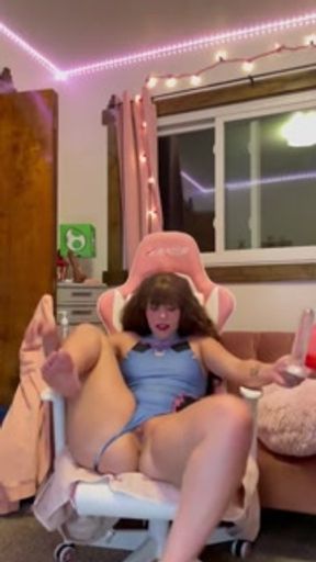Sexy DVA cosplay girl riding toy in game chair