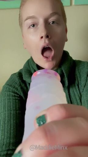 Ginger Milf spits and gags on giant dildo