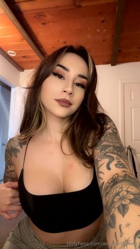 Cute Latina goth chick shows off her solo boobs