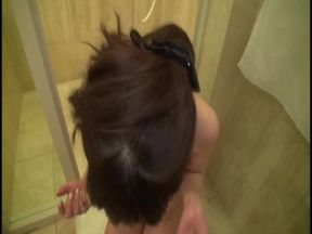 A Smooth-skinned Beauty Shares a Tender Moment Beneath the Warmth of the Shower