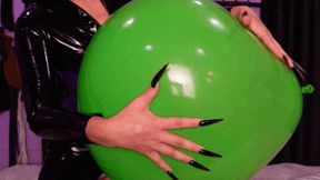 Playing with balloon in latex, riding it, and long nails scratching