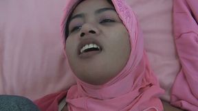 Cute Asian babe in hijab fucks in missionary style