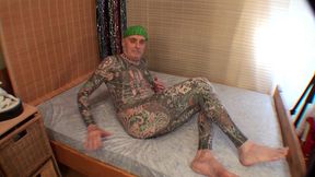 leeharper pinnomen – the fully body tattooed adult male model - performed on the blue mattress as he was hired to put his nude male body on full display to engage his sexually aroused spectators !