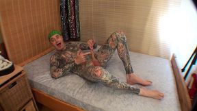 leeharper pinnomen – the fully body tattooed adult male model - performed on the blue mattress as he was hired to put his nude male body on full display to engage his sexually aroused spectators !