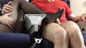 Stewardess gives nylon footjob in plane!
