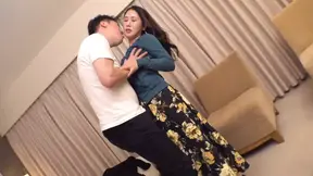 Slender Asian MILF gives big tit beauty a handjob