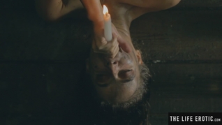 Sexy brunette squirting as she fucks herself with a lit candle