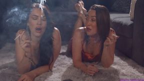 Chloe and Scarlett smoking corks as they try smoke rings and chat