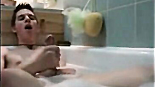 Twink jerking off in bathtub 10