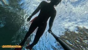 Carissa snorkeling in her Christmas outfit with exposure part two