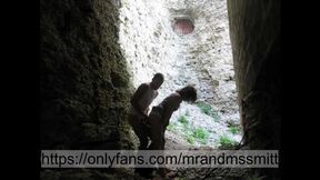 Russian brunette publicly sucks a stranger in a fortress and gets her pussy fucked