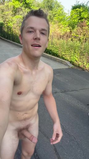 Public twink plays with his cock