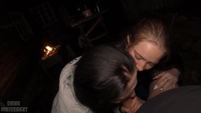 Two homeless girls give a double blowjob to a lucky guy near the fire