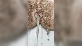 Super hairy pussy pissing hissy with slightly anal farting