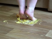Fat legs bare feet mercilessly trampled banana and raw eggs. Crush Fetish.