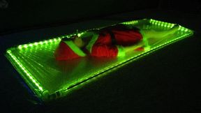 Sonya in a glowing vacuum bed