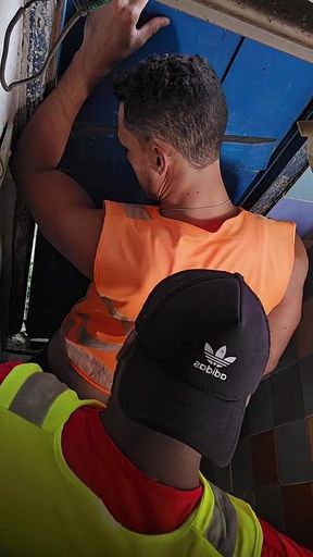 Construction Site Bathroom and Workers