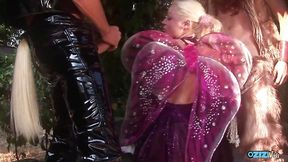 Outdoor threesome between two guys in costumes and a horny cock sucking blonde milf