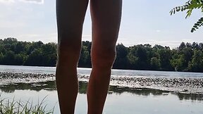 Sitting on a dildo in public by the river in summer