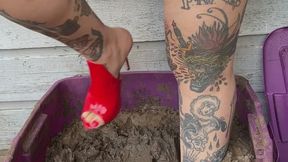 Red patent mules in mud