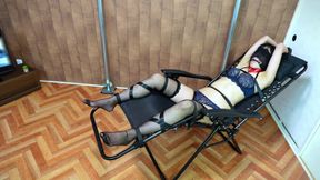 A Woman Is Restrained and Teased with Erotic Lotion
