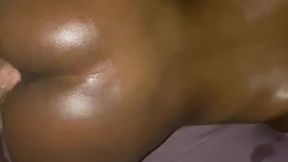 Oiled up Ebony rides me doggy style