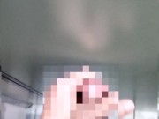 A hairy Japanese man masturbates in the bathroom. His semen splashed on the door.