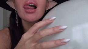 The shrill sound of a witch scratching a balloon c