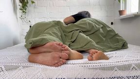 female male bare feet under the blanket m2