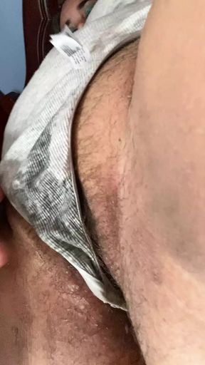 Fat and hairy pussy squirts on top of the thread thong