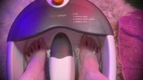 Smooth trans twink washes her pretty legs and rubs cream all over them