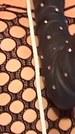Mature Leather Domme Binds Her Fishnet Slave