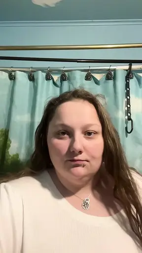 Curvy MILF strips and shows off big tits and fat ass
