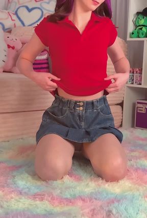 Cute girl in red shirt and blue shorts