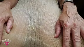Hot mom pees in see-through shirt with pierced nipples