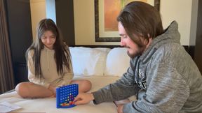 Couple loses clothes playing strip Connect 4 in bed