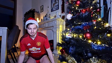 This X-Mas twink slut jerks his big uncut dick