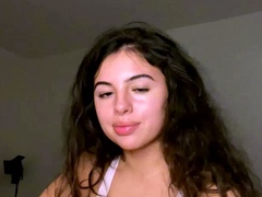 Amateur young brunette enjoys dildo on solo masturbation